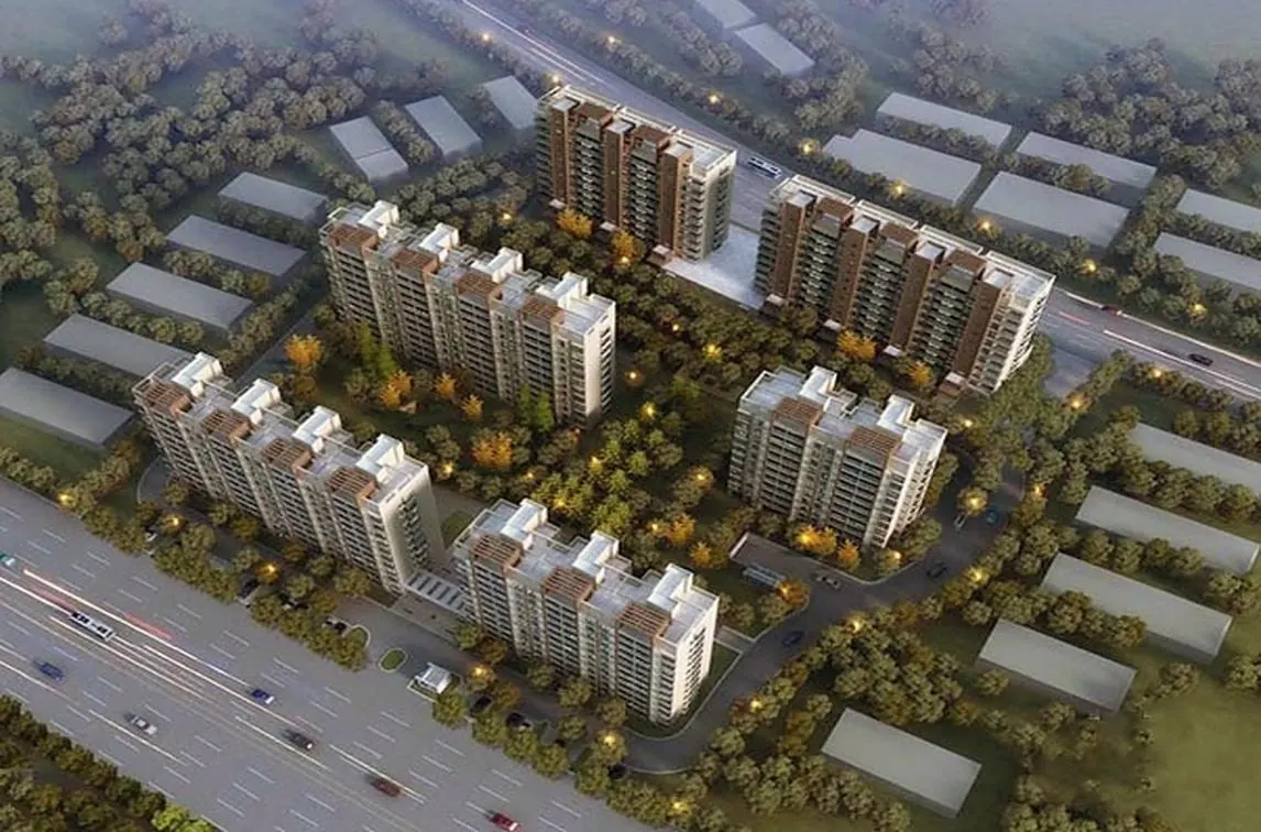 Aerial view of Baili Mingzhu Garden, with residential blocks arranged around landscaped courtyards.