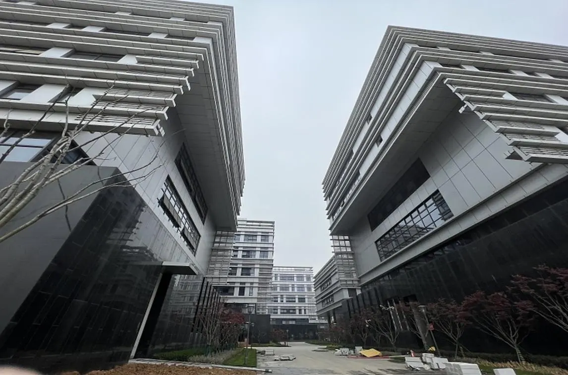 Contemporary public courtyard and landscaped pedestrian space at the Xiaowangsheng rural landscaping project.
